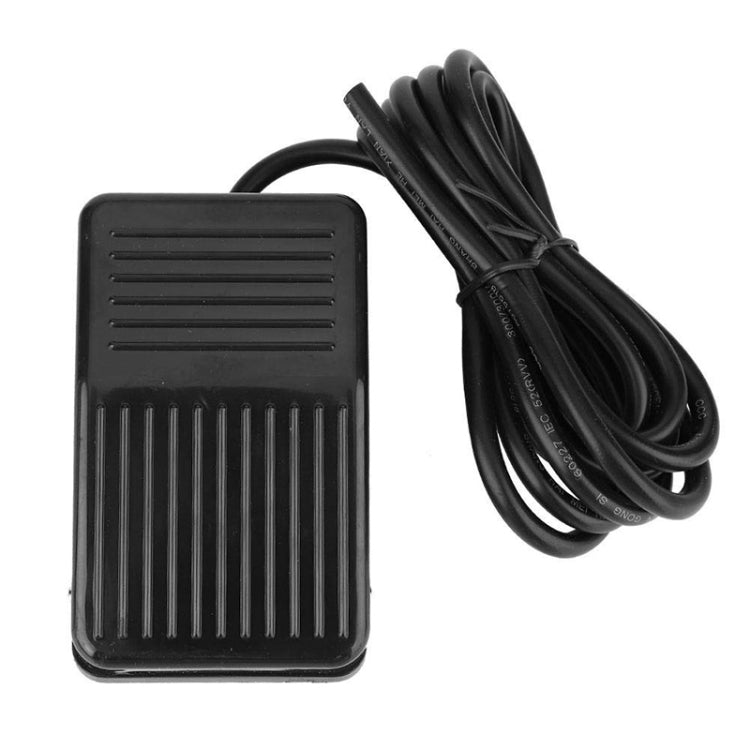 Black plastic foot control pedal switch with cable, ridged anti-slip base