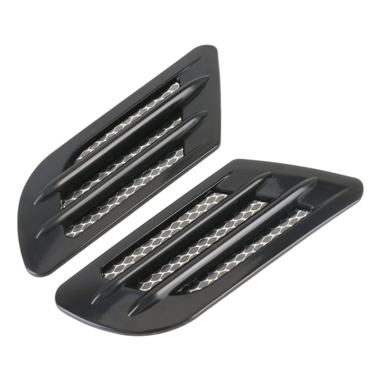Pair of black car vent grille decoration stickers with silver mesh inserts
