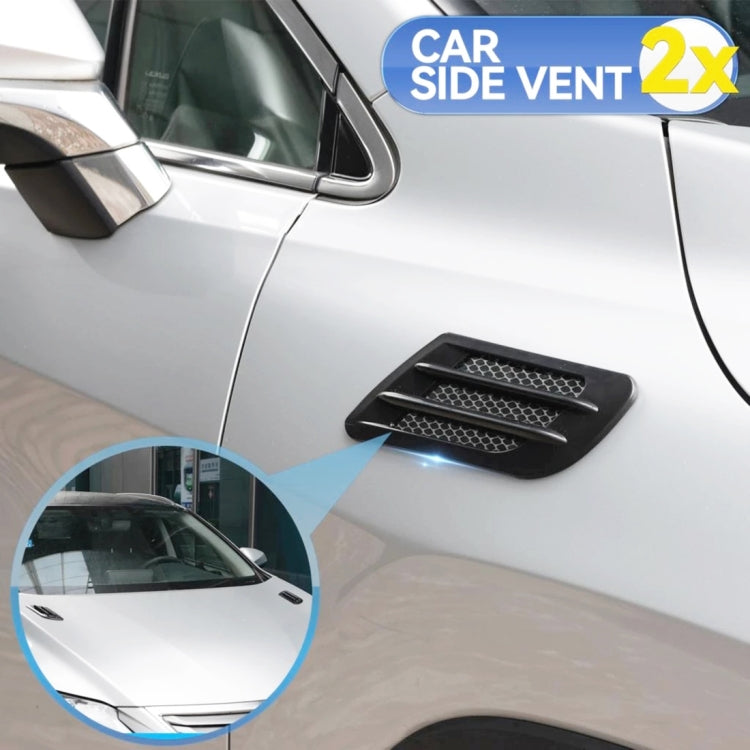 Pair of car side vent grille stickers applied on a car door