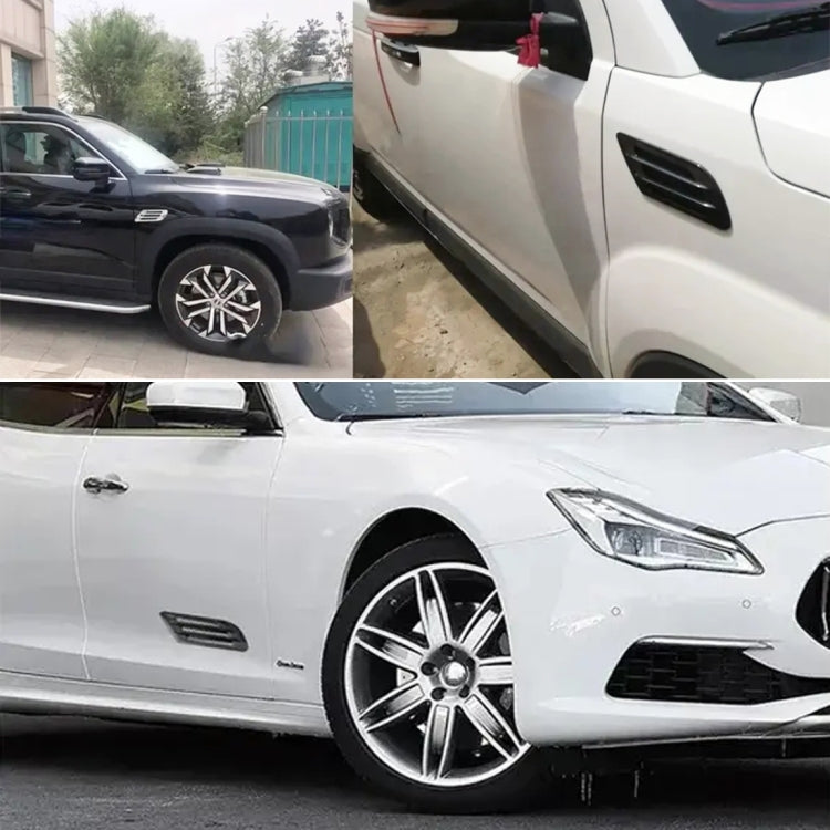 Pair of car vent grille stickers on a white car front quarter