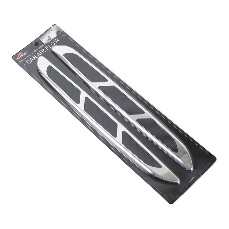 Car airflow vent grille decal pair on card, chrome and black