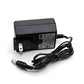 Black power adapter with AC plug and DC barrel cable