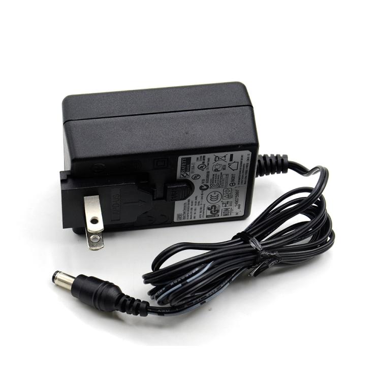 Black power adapter with AC plug and DC barrel cable