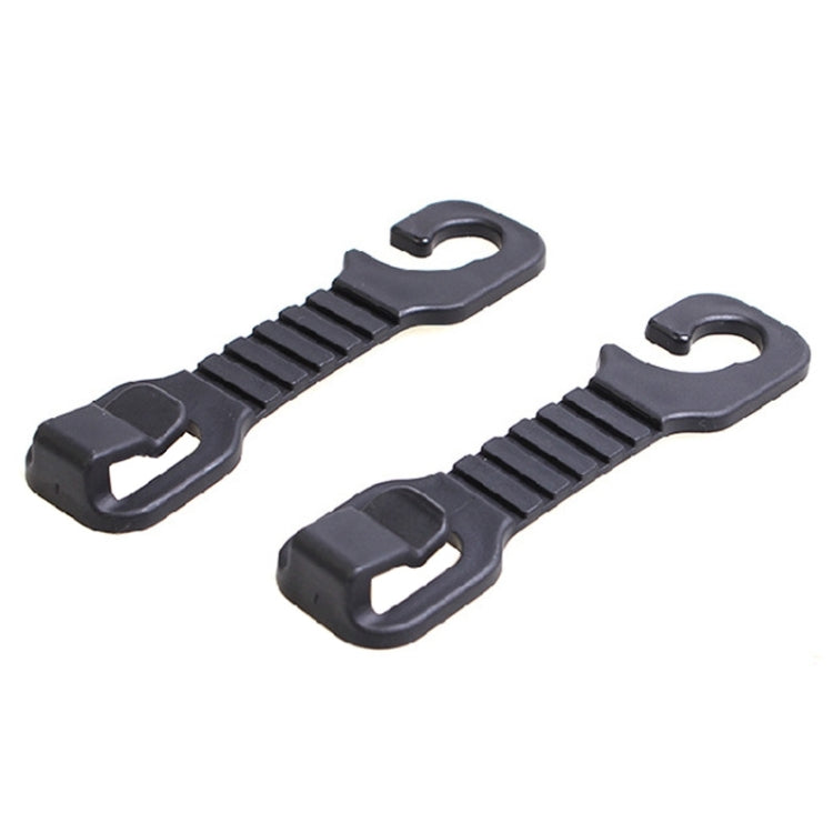 Set of two black plastic seat back hooks with striped grip pads