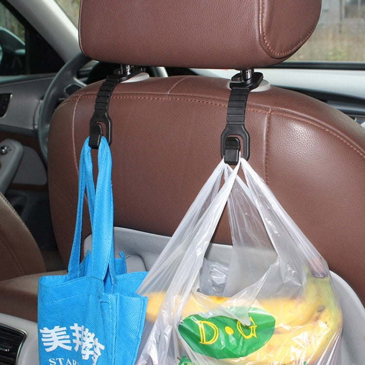 Car seat back bag holder hooks holding blue tote and clear plastic bag on seat