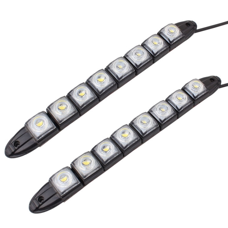 Pair of black LED daytime running light bars with square LEDs and wire leads