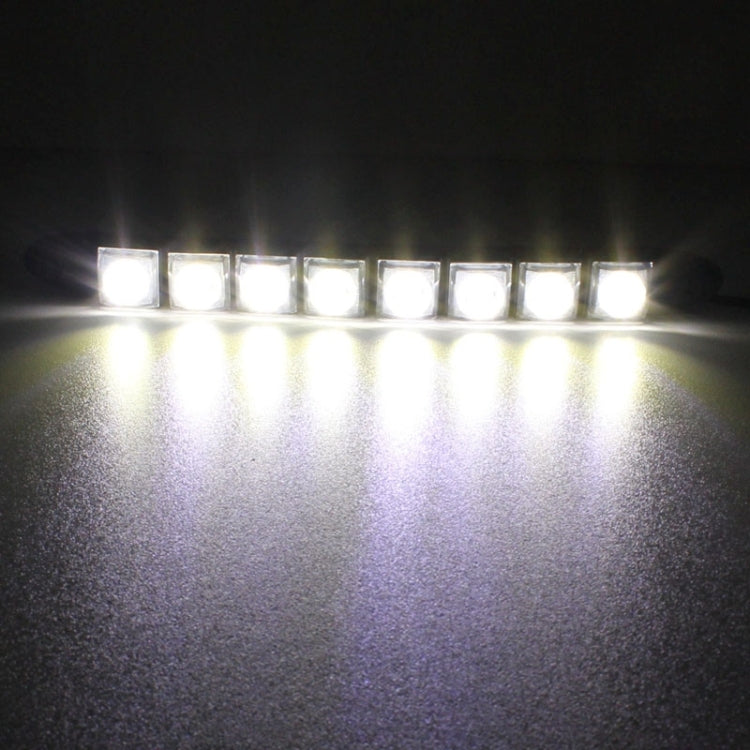 Illuminated LED daytime running light bar with bright row of square bulbs