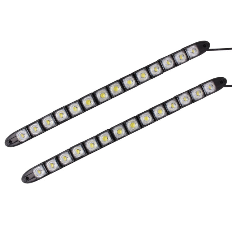 Pair of flexible black LED daytime running light strips with evenly spaced square LEDs