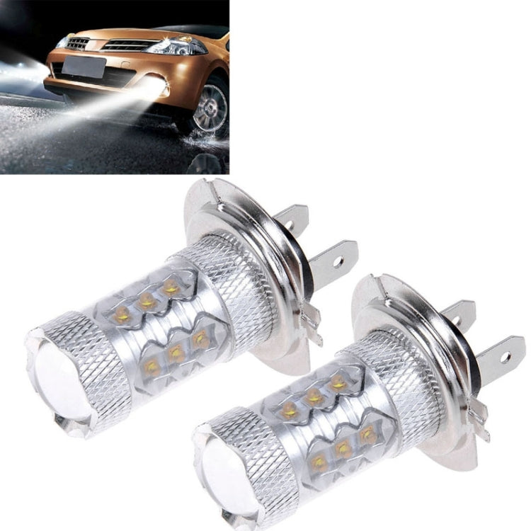 Two H7 LED fog light bulbs with metal fins and LED emitters