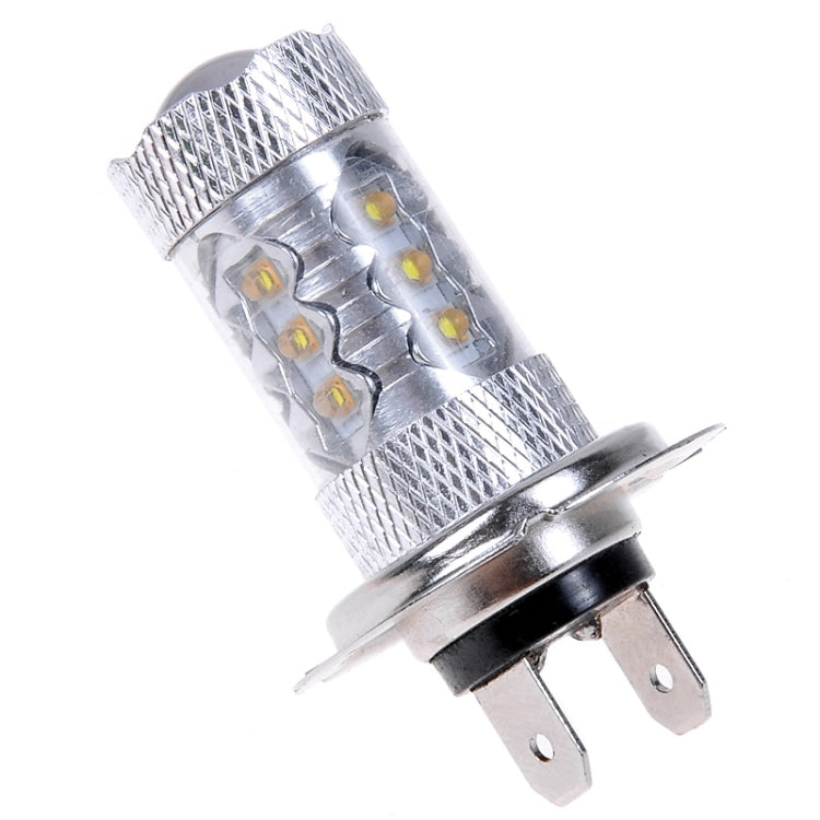 H7 LED fog light bulb, top view with clear lens and four yellow LED chips