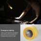Yellow emergency flashlight with circular front lens and silver textured body