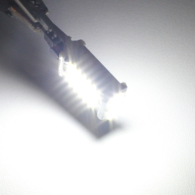 T15 LED backup bulb illuminated, emitting bright white light from LED chips.