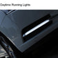 Vehicle front showing long white daytime running light strip