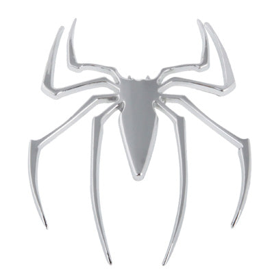 Chrome metal spider style badge with raised webbed legs, shiny finish