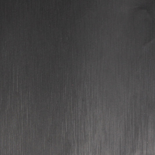 Dark textured protective vinyl film close-up, matte surface