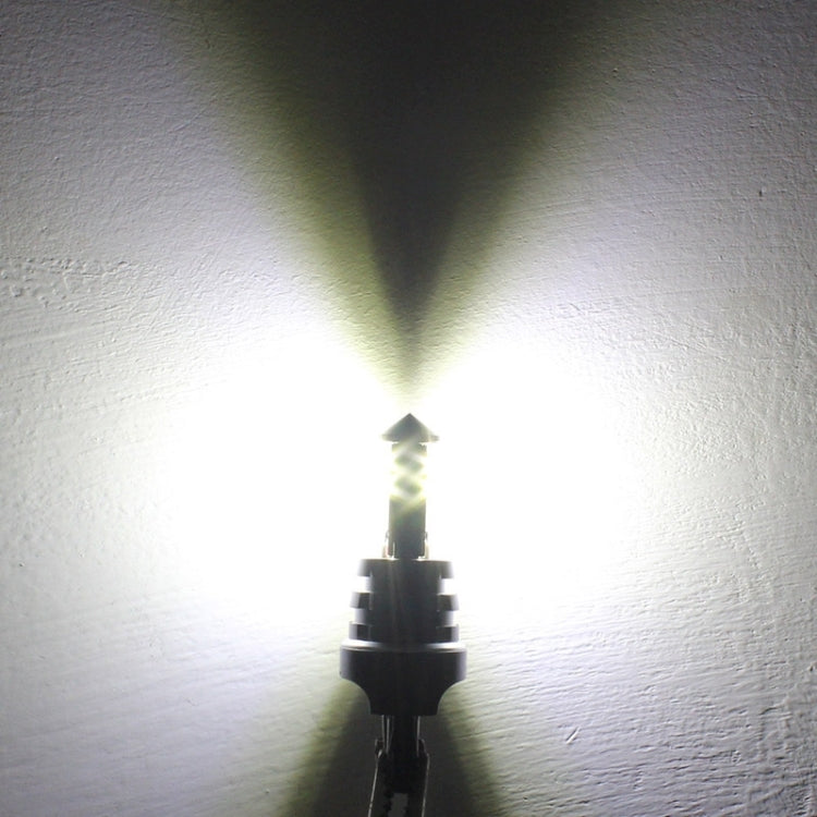 White LED car bulb emitting bright light from the black base