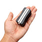 Wiper blade restorer tool held in hand, black body with chrome rails