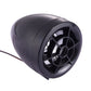 Black motorcycle speaker with circular grille and visible red/black cable
