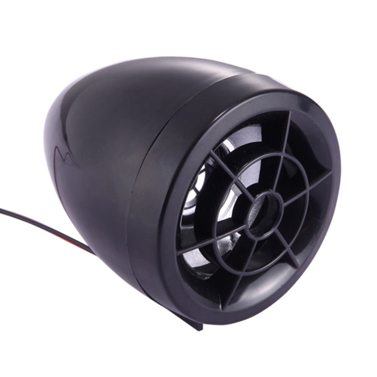 Black motorcycle speaker with circular grille and visible red/black cable