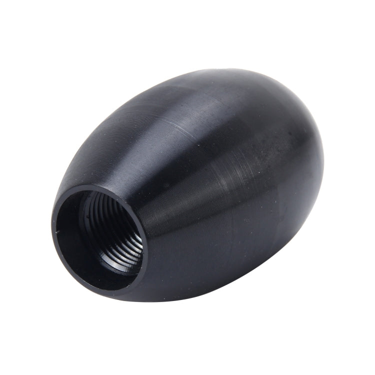 Black gear shift knob with open end showing threaded mounting hole