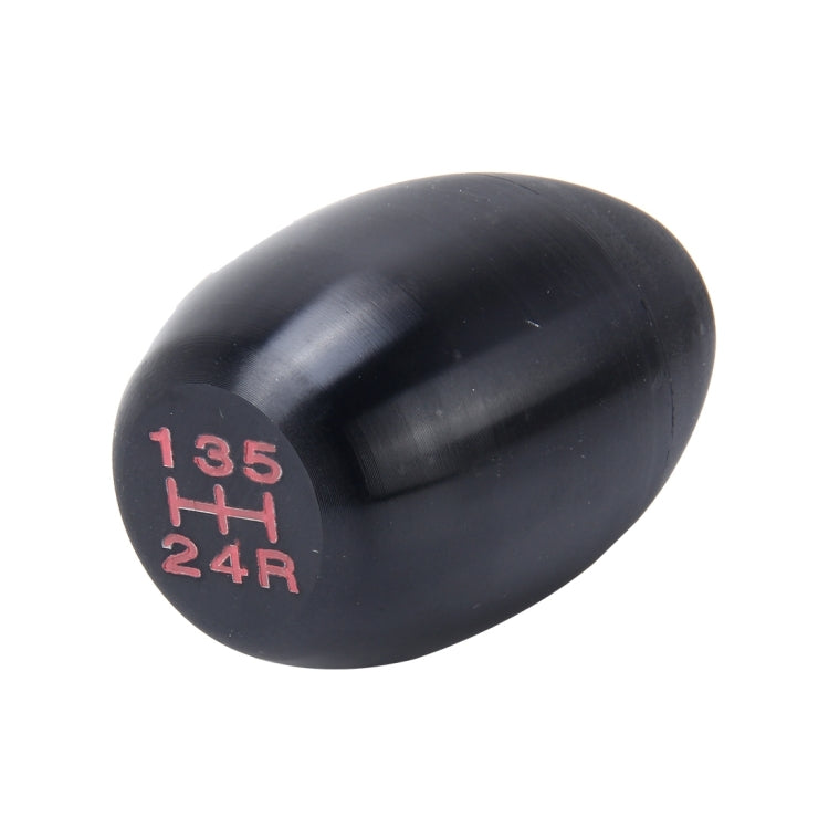 Black gear shift knob with red 135 4H 24R markings on side