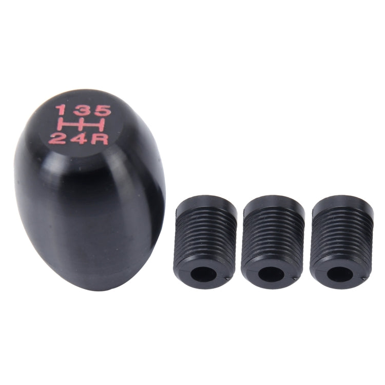 Black gear shift knob with red 135 4H 24R markings and three threaded sleeves
