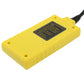 Yellow diagnostic tool housing with warning label and attached cable