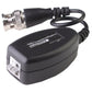 Black video balun transceiver with RJ45 connector and BNC coax plug, close-up