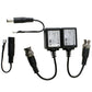 Passive balun transceiver pair, two black modules with RJ45-style ports and BNC leads