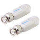 Two white video baluns with threaded BNC male connectors, close-up