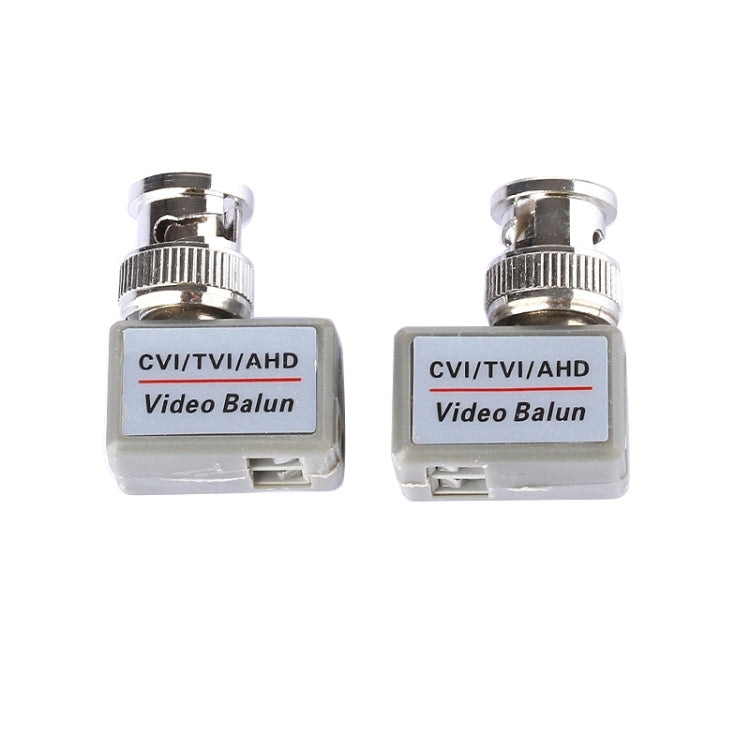 Pair of gray video balun adapters labeled CVI/TVI/AHD with BNC-style ports