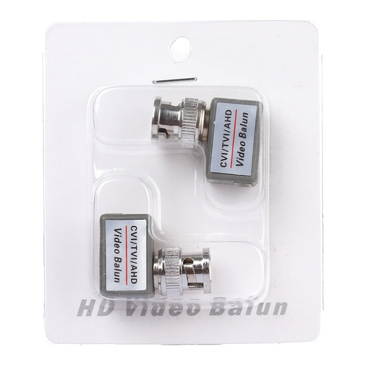 Two passive video balun adapters in clear blister package with BNC-style ports