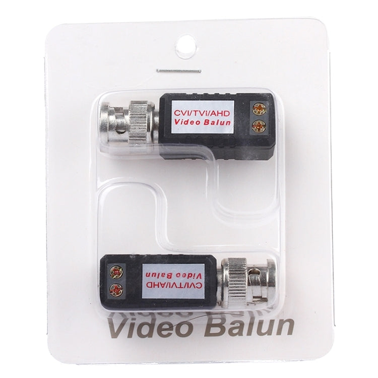 Black video balun in blister package with BNC connector and terminal block