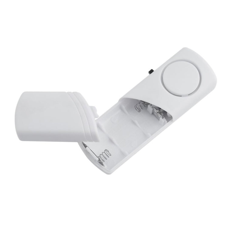 Wireless door/window alarm with open battery compartment and magnetic sensor