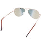 Close-up of rose-gold aviator sunglasses with dark reflective lenses