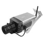 Silver dummy security camera with black IR lens housing and front-mounted antenna