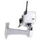 Dummy security camera with long antenna, back panel, and wall-mount bracket