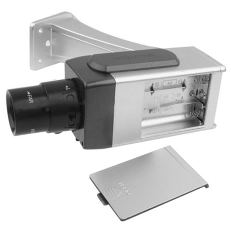 Dummy security camera with black lens unit, side cover, and mounting bracket