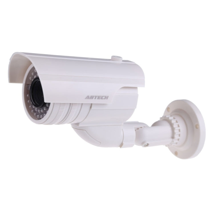 White dummy security CCTV camera with visible lens and IR LED ring