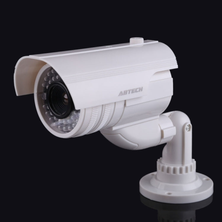 White dummy CCTV camera with angled housing and wall-mount base