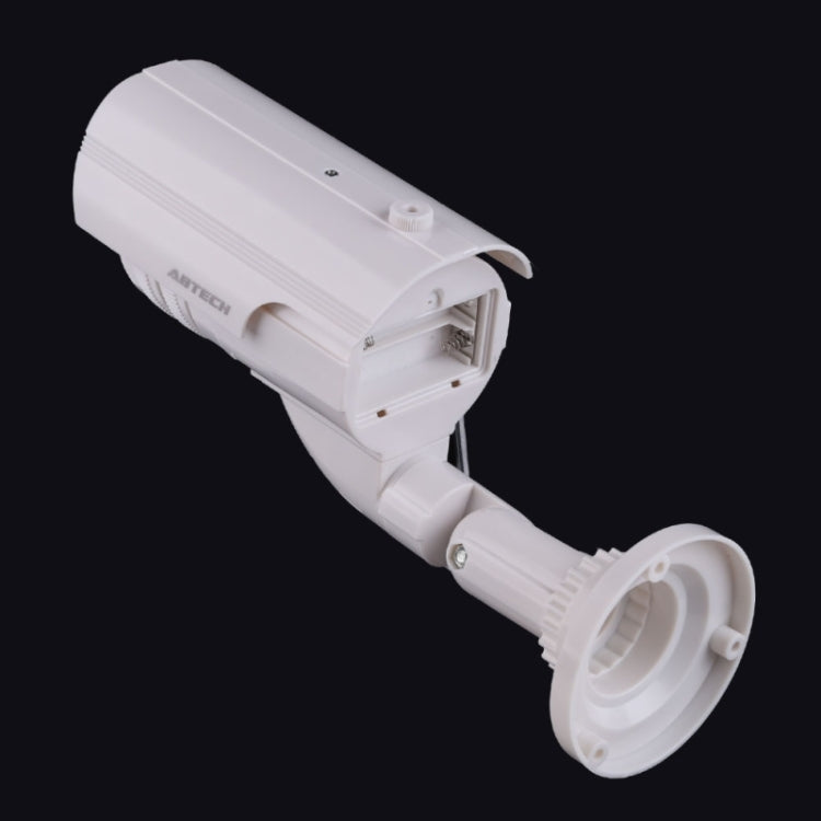 White dummy CCTV camera body with mounting arm and large swivel base