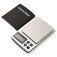 Digital pocket scale with black cover, white stainless base, and LCD display window