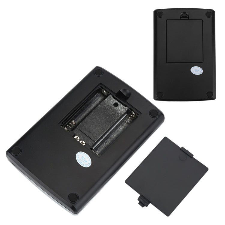 Digital pocket scale with open battery compartment and removable black cover