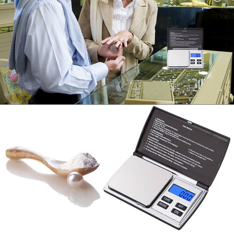 Digital jewelry scale with open platform and LCD reading 0.00, tare controls visible