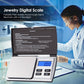 Digital jewelry scale with open lid, LCD backlit display, and tare/mode/off buttons