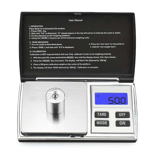 Digital diamond scale in open case with round platform and blue LCD display