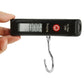 Black handheld luggage scale with digital screen, red power button, and hanging hook