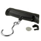 Black luggage scale with metal hook, bottom strap clip, and circular battery cover