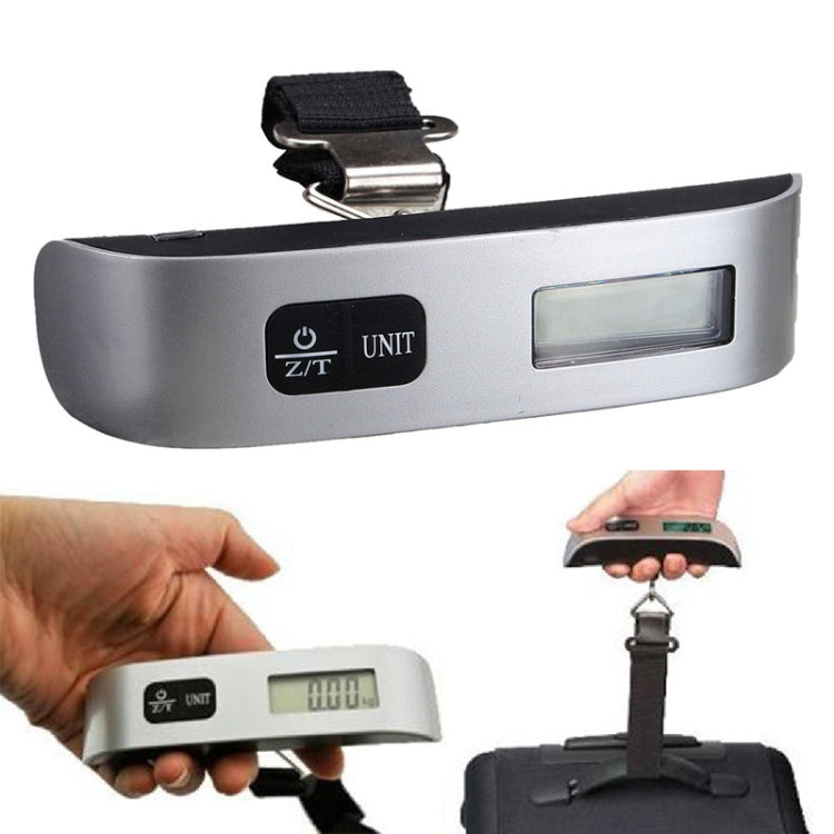 Mini handheld luggage electronic scale with LCD display and black carrying strap