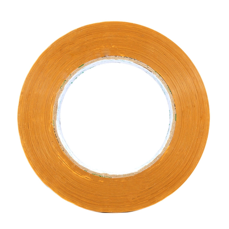 Yellow adhesive tape roll, top view with inner core